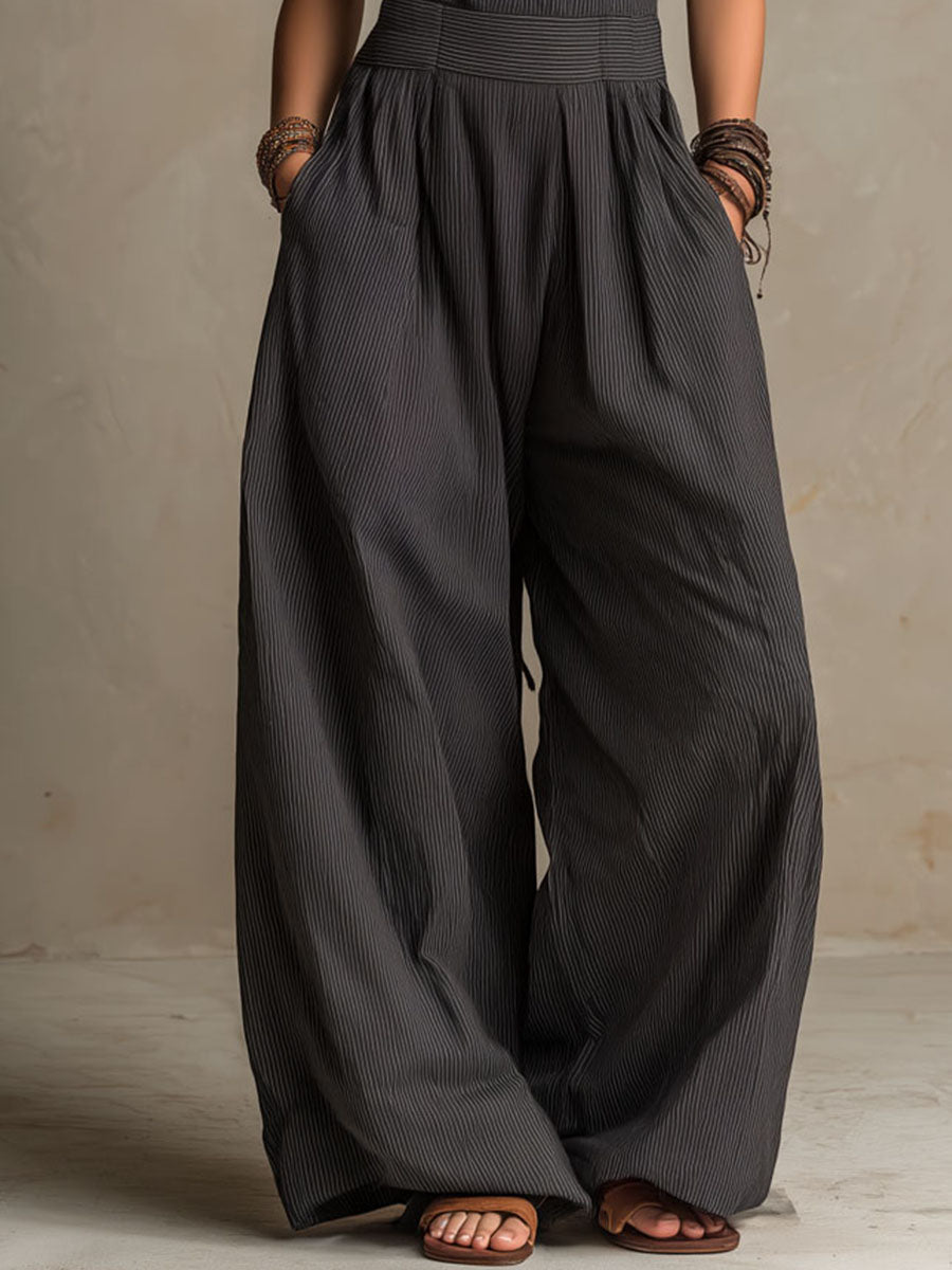 MIRIAM - TUTA PALAZZO CHIC CON SPALLINE INCROCIATE